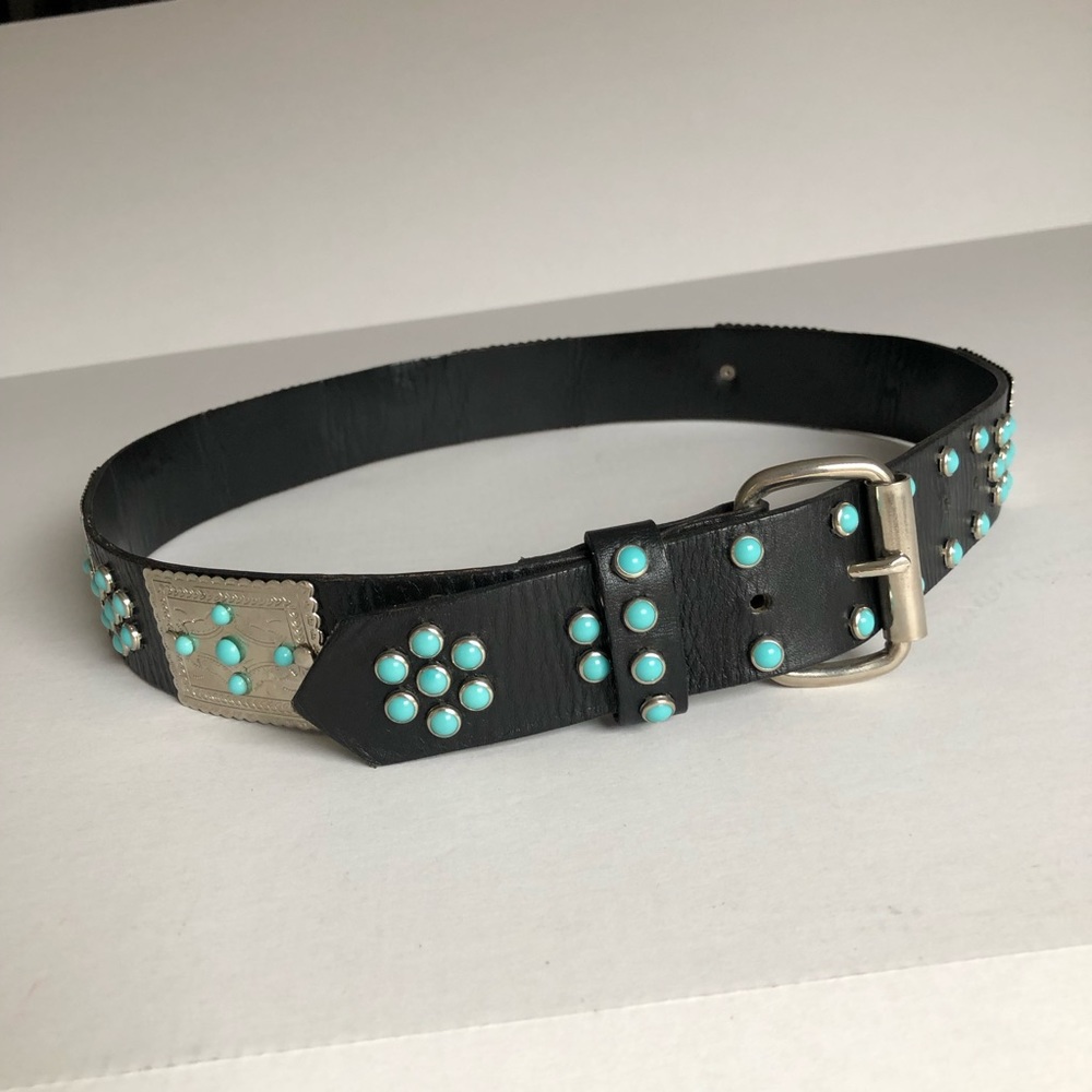 Design leather belt. Ornamented.